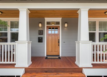 Covered porch and front door of beautiful new home.