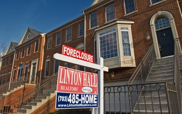 A recently foreclosed townhouse is seen
