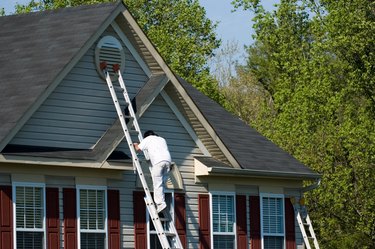 Saw this while walking home. Watching him balance the ladder on