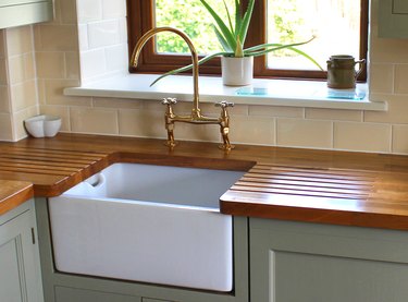 Image of farmhouse kitchen, Belfast/Butler sink, real wood countertop.