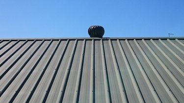 Roof with fan on top.