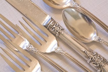 Antique silverware place setting.