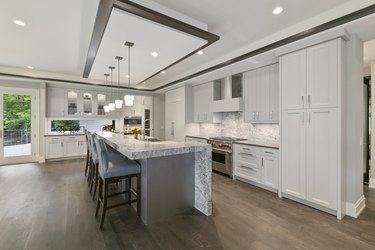 Wide-open kitchen with LED lighting and recessed lighting.