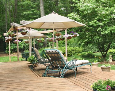 Lounge chairs and plants on inviting deck