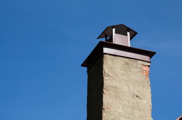 Cap on a cement chimney