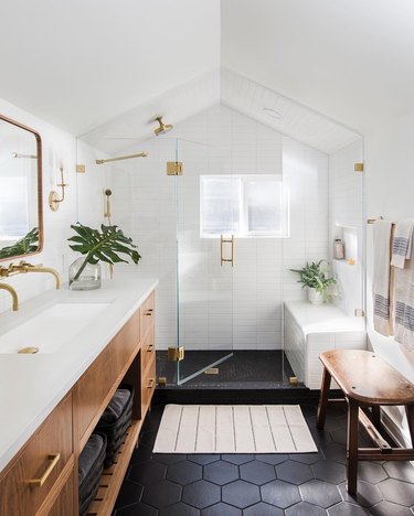 Black and white bathroom with green and gold
