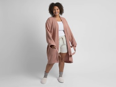 woman wearing parachute cloud cotton robe in clay color