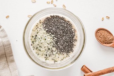 Adding hemp seeds and chia seeds to a jar