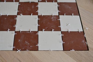 Red and white tiles with tile spaces placed between