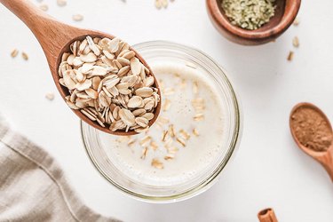 Oats and milk in a glass jar