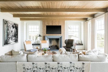 Living room TV idea with wood fireplace surround