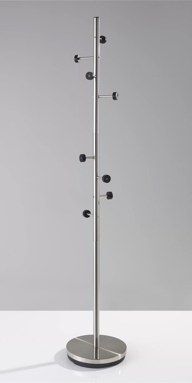 metal coat rack with pegs and sturdy circular base