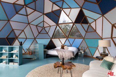 Room with a kaleidoscopic design showing pastel colors in a dome shape.