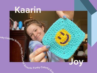 A photo of influencer Kaarin Joy holding a teal crocheted coaster with a yellow smiley face on it.