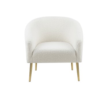 white fluffy chair with gold legs
