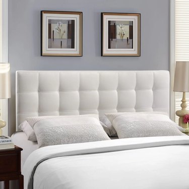 white tufted faux-leather headboard