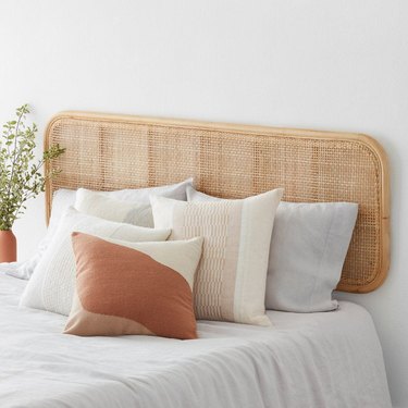 rattan and cane rounded rectangular headboard