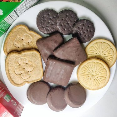 Girl Scout cookies on a white plate