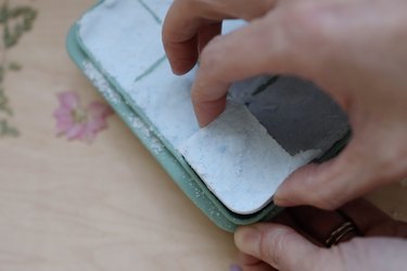 Removing dried shower steamer tablet from silicone mold