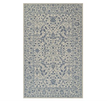 floral rug in blue and off-white