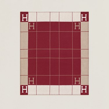 red and beige hermes throw