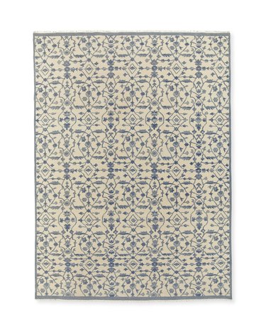 blue and beige floral rug