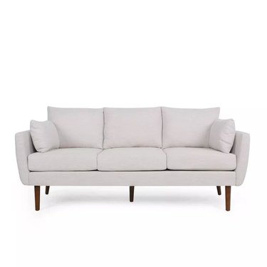 beige pillow-back sofa