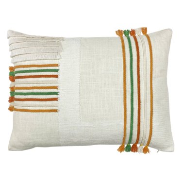 off-white lumbar pillow with striped woven design