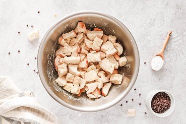 Bread soaking in custard