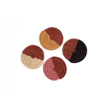 four round coasters in various colors
