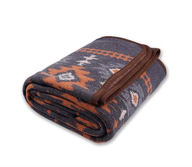 gray and orange patterned wool blanket