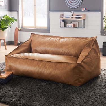 West Elm caramel vegan leather lounger sofa