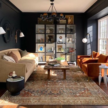 black living room with orange accents