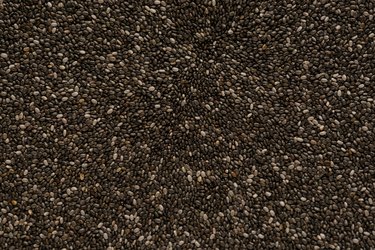 A close up image of black chia seeds.