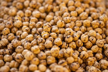 A photo of chickpeas covered in seasoning.