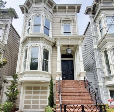 A beautiful cream and white Victorian home in San Francisco. This is the same house that was used as the exterior of the Tanner home in the TV show, Full House.
