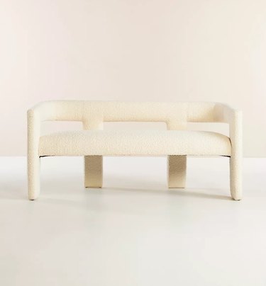 white sculptural boucle bench with back