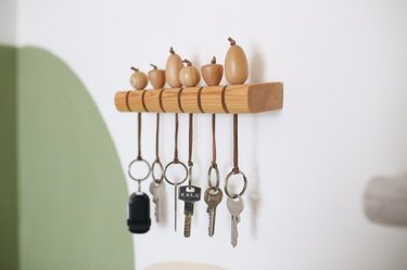 key hooks with fruit emblems