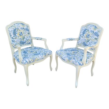 two blue and white french chairs