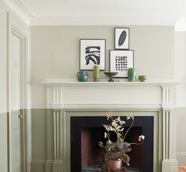 fireplace area with off-white and green colors