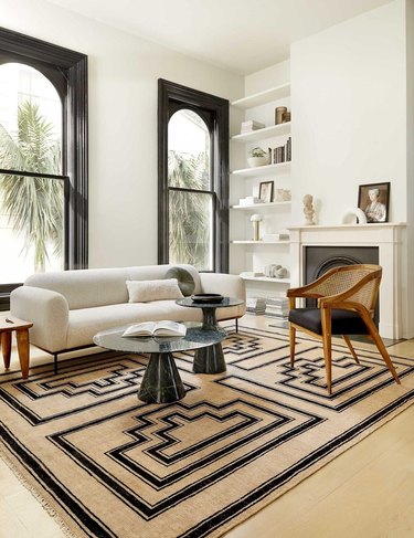 sophisticated living room with large patterned rug