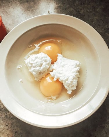 Cottage cheese and eggs in a bowl