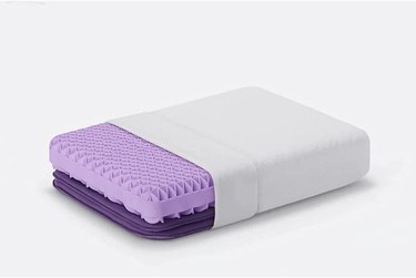 purple pillow with white cover
