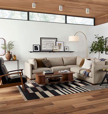 neutral living room with geometric rug
