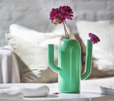 cactus-like vase with magenta flowers