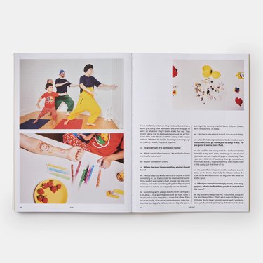 book with open pages featuring bright photographs and black text
