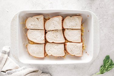 Bread slices on top of cheese