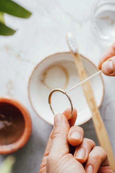 Use a toothpick to clean jewelry settings