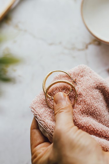 Finish your jewelry cleaning by polishing it with a soft rag