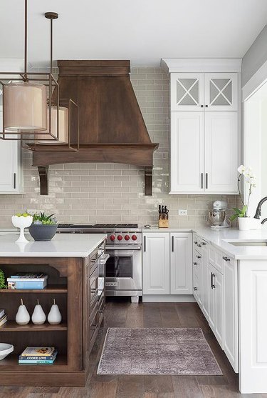 traditional white kitchen with french wood hood